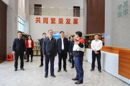 自治区党委组织部部长王维平率队深入田林山茶油工厂调研